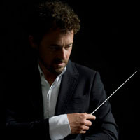 Portret pierwszego dyrygenta gościnnego Mastro Jean-Luca Tingauda